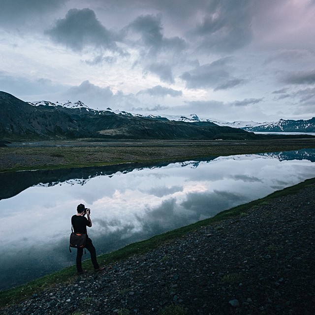 Self-portrait on an Icelandic highland road surrounded by glacial landscape